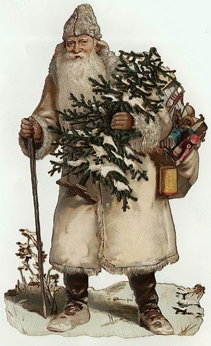 Imaxe do Juenmanden ou Yule Father coa súa característica árbore, desta vez vestido de branco.